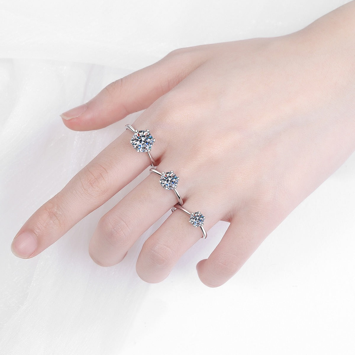 Round Moissanite Adjustable Three Stone Ring product view showing moissanite setting and metal finish