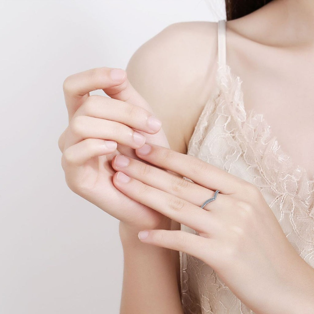 Slim Moissanite Band Ring worn on hand to show scale and ring profile