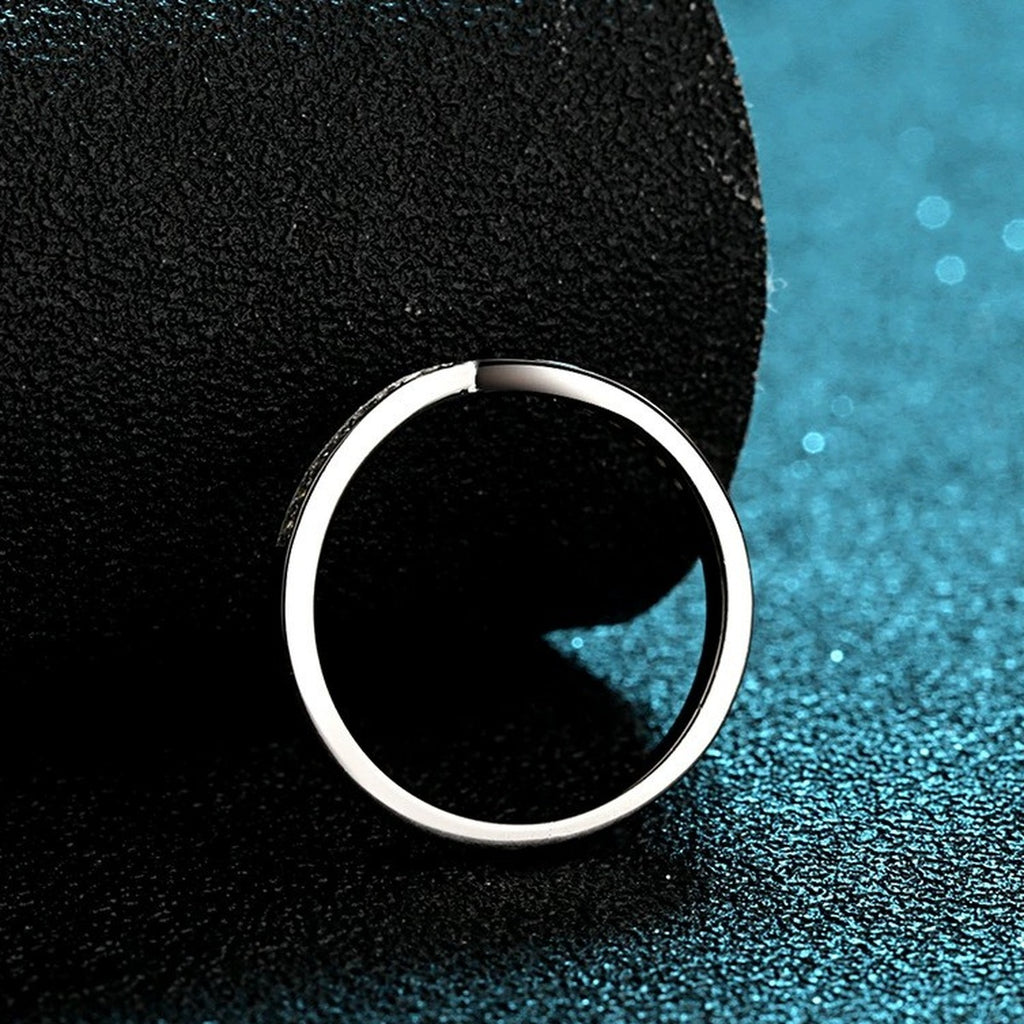 Slim Moissanite Band Ring product view showing moissanite setting and rhodium finish
