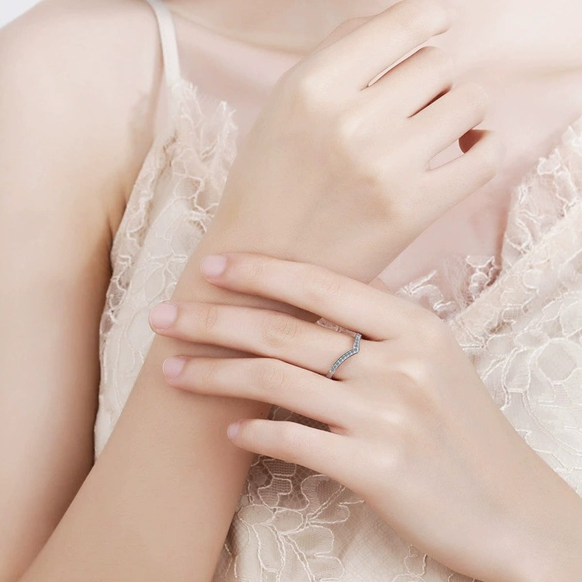 Slim Moissanite Band Ring worn on hand to show scale and ring profile