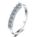 Curved Pave Moissanite Band Ring in rhodium-plated S925 sterling silver on clean white background