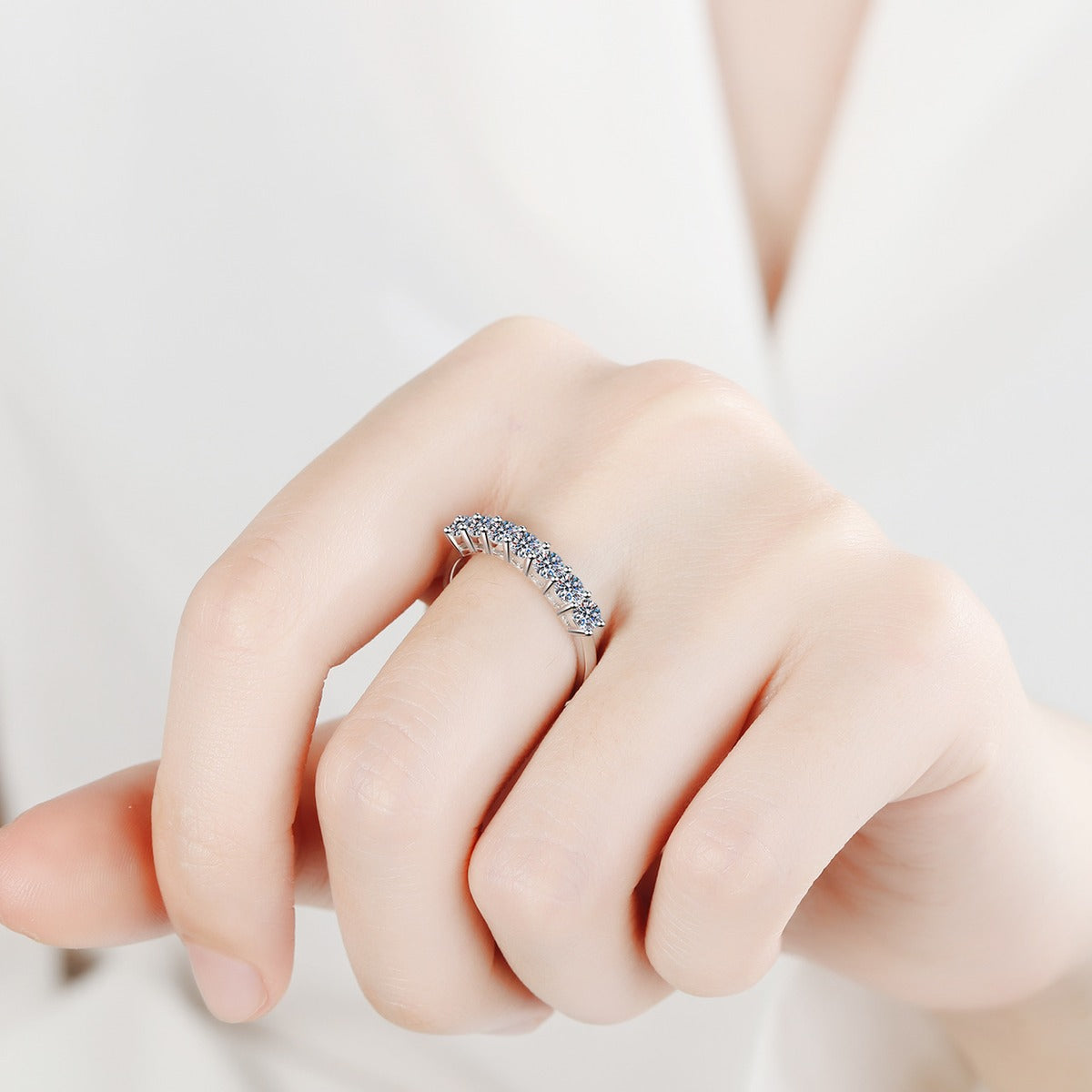 Curved Pave Moissanite Band Ring worn on hand to show scale and ring profile