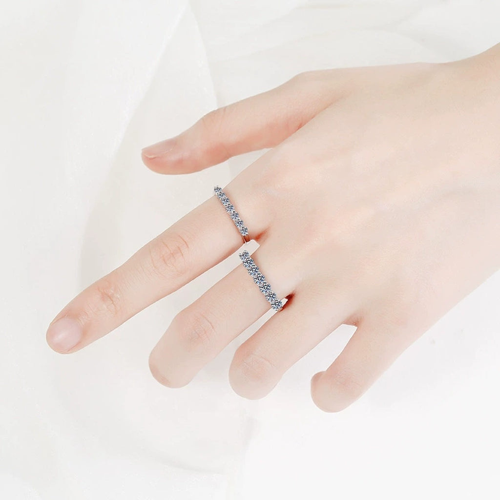 Curved Pave Moissanite Band Ring worn on hand to show scale and ring profile