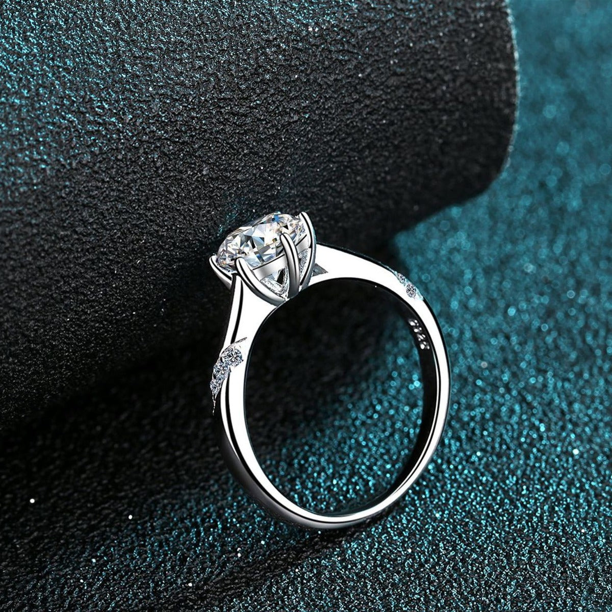 Round Moissanite Solitaire Ring product view showing moissanite setting and rhodium finish