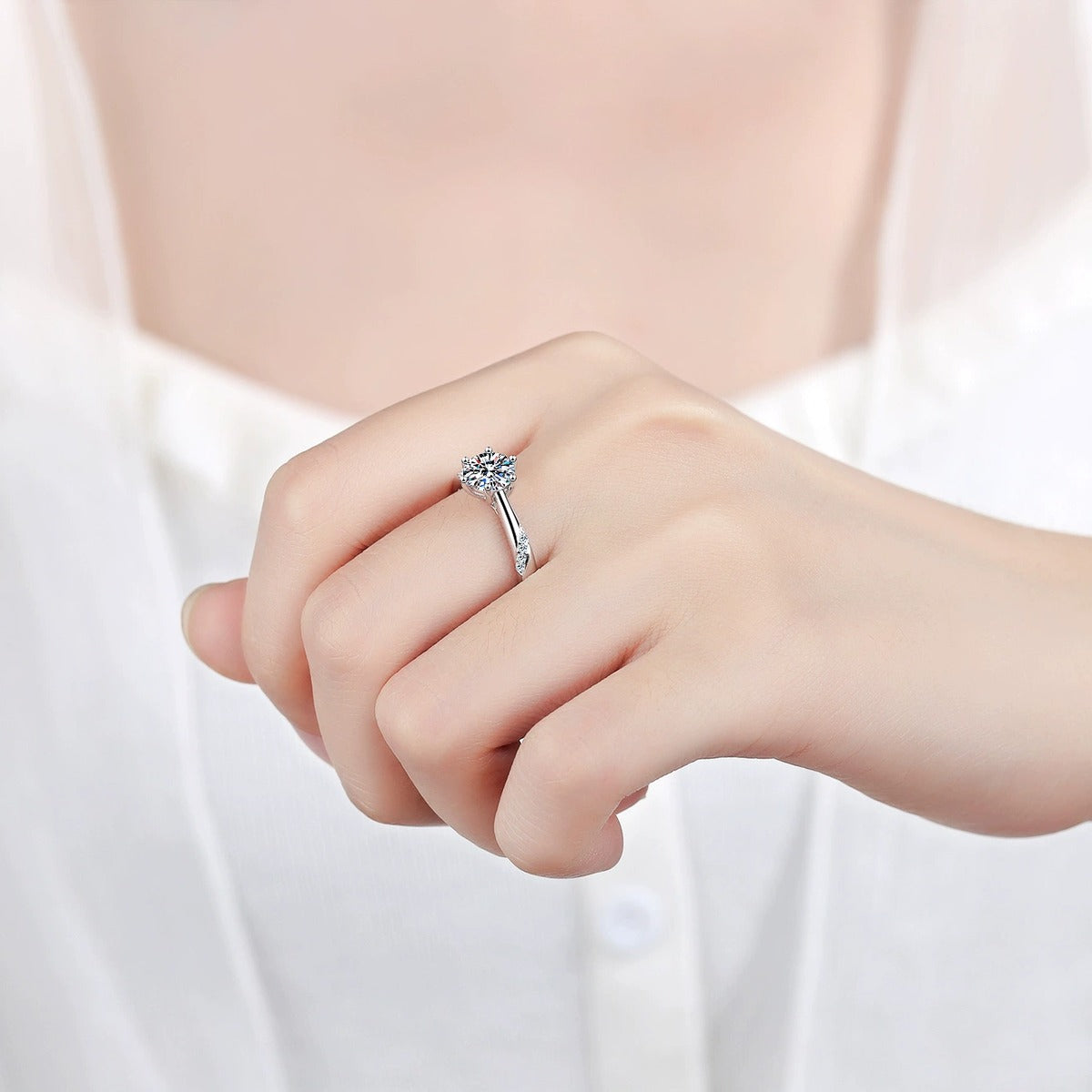 Round Moissanite Solitaire Ring worn on hand to show scale and ring profile