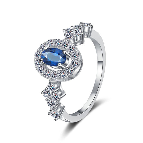 Blue and White Oval Moissanite Ring with CZ in Rhodium-Plated S925 Sterling Silver clean white background product photo showing the ring silhouette and moissanite setting