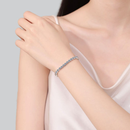 Beaded Round Moissanite Tennis Bracelet in Rhodium-Plated S925 sterling silver worn on wrist model view showing scale and adjustable fit