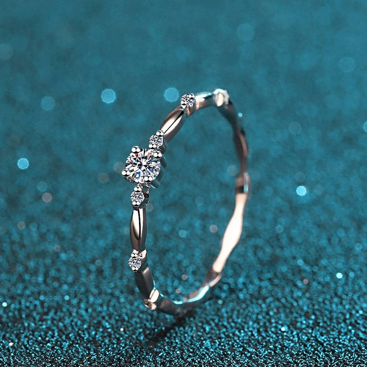 Twist Moissanite Band Ring with CZ product view showing moissanite setting and rhodium finish