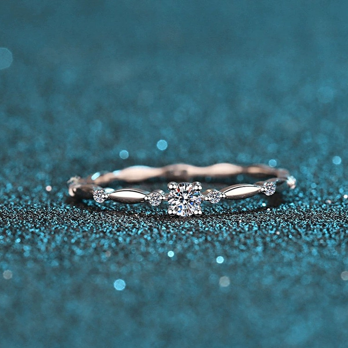 Twist Moissanite Band Ring with CZ product view showing moissanite setting and rhodium finish