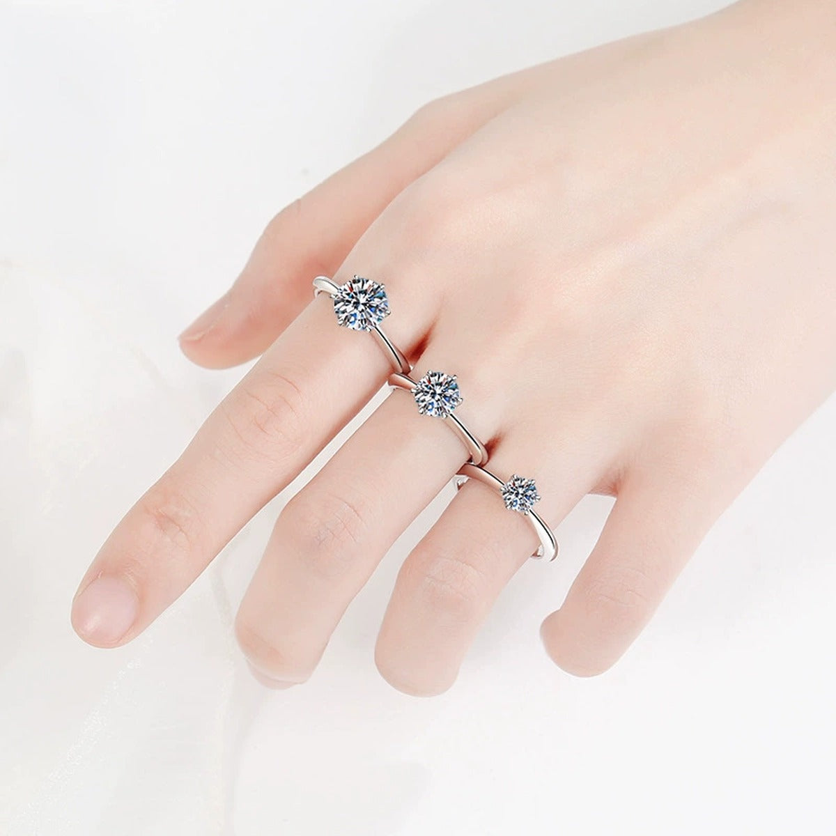 Round Moissanite Solitaire Ring worn on hand to show scale and ring profile