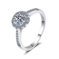 Round Halo Moissanite Ring with CZ in rhodium-plated S925 sterling silver on clean white background