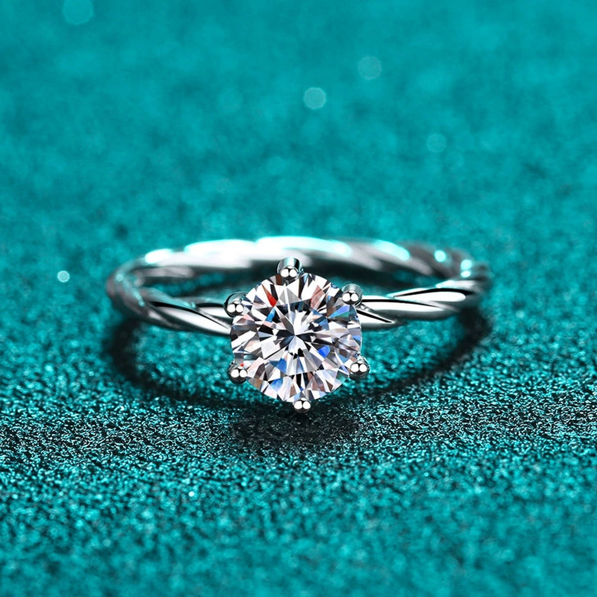 Round Moissanite Ring product view showing moissanite setting and rhodium finish