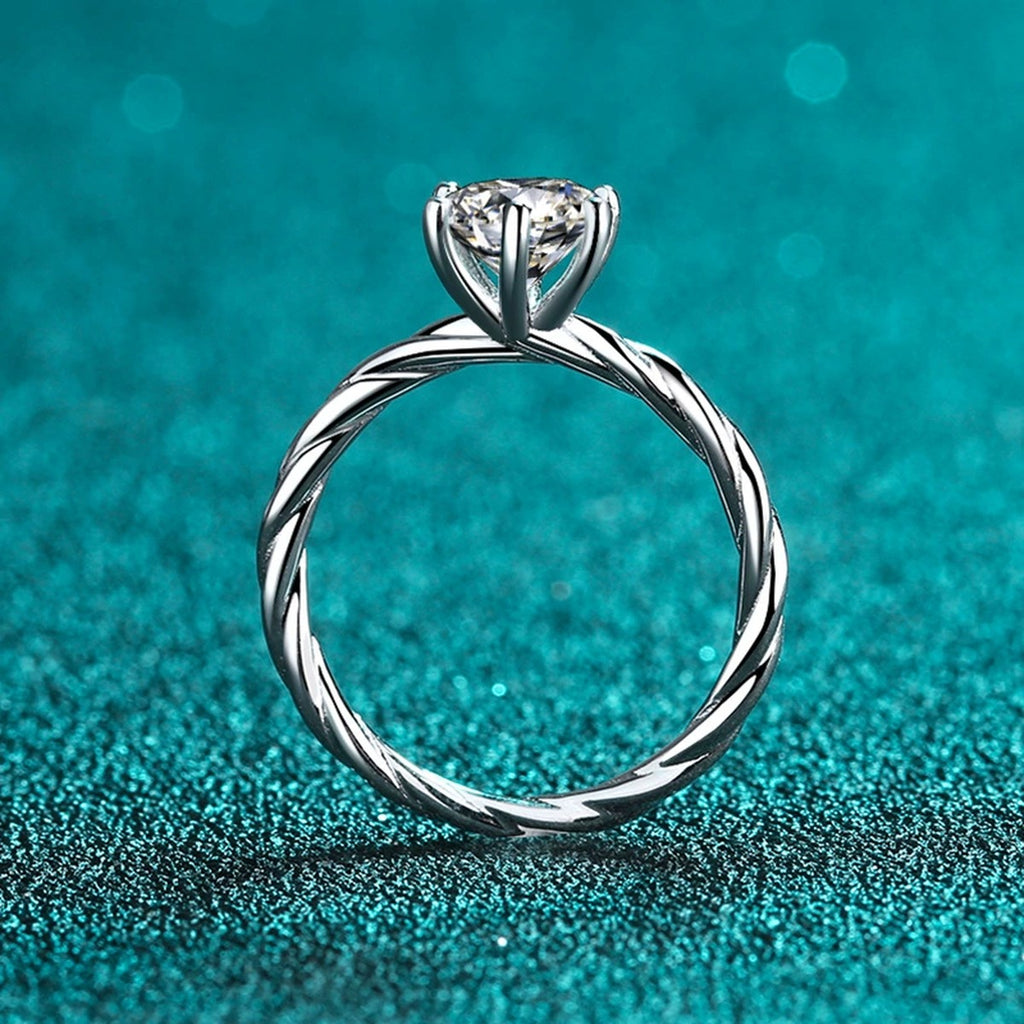 Round Moissanite Ring product view showing moissanite setting and rhodium finish
