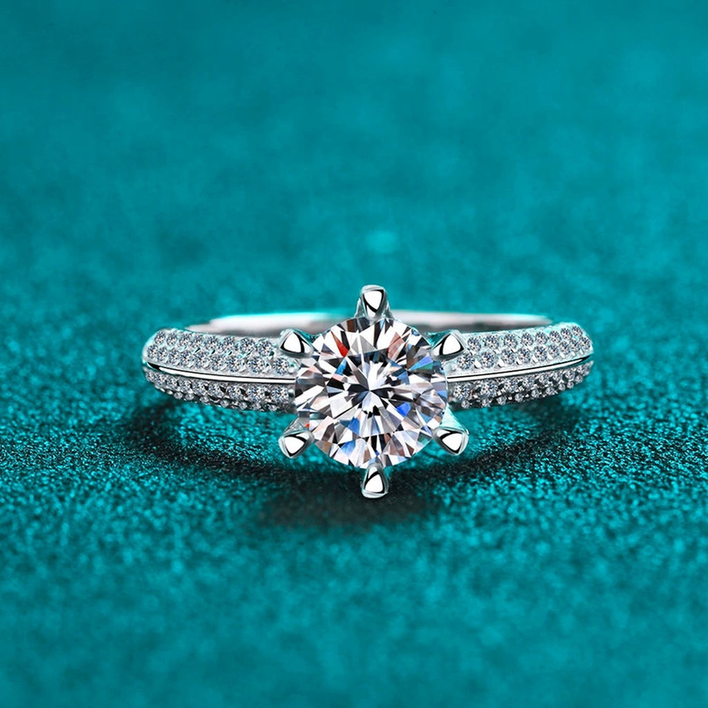 Round Moissanite Side Stone Ring with CZ product view showing moissanite setting and rhodium finish