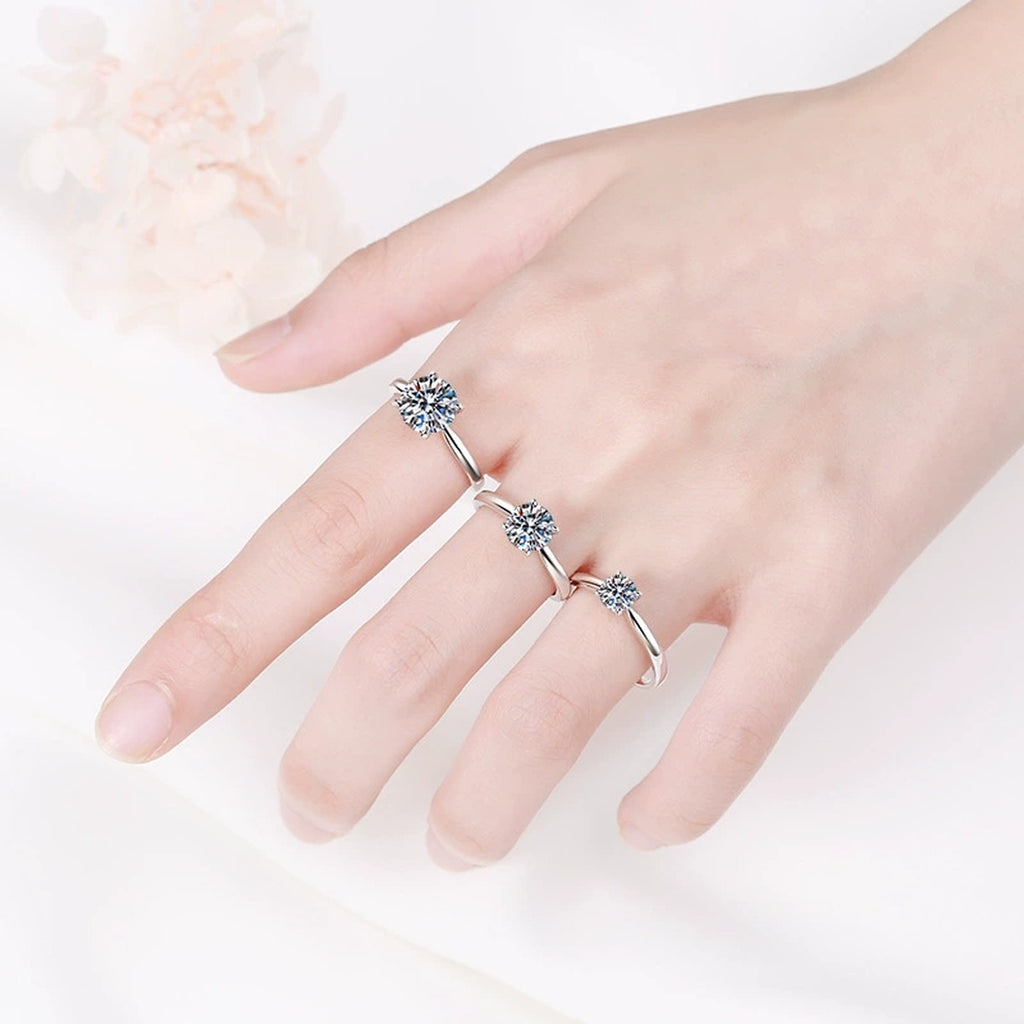 Round Moissanite Ring worn on hand to show scale and ring profile