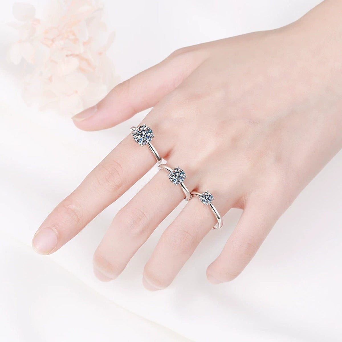 Round Moissanite Ring worn on hand to show scale and ring profile