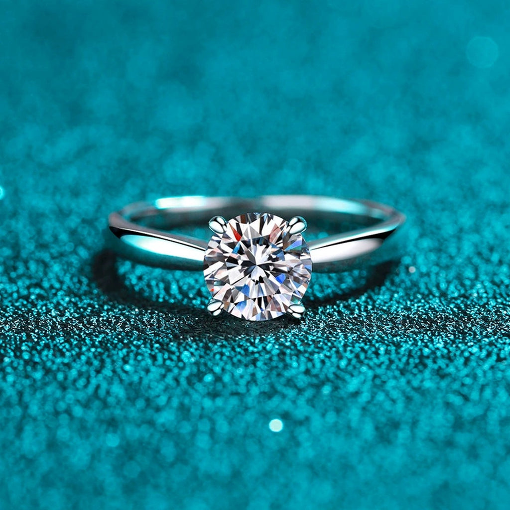 Round Moissanite Ring product view showing moissanite setting and rhodium finish