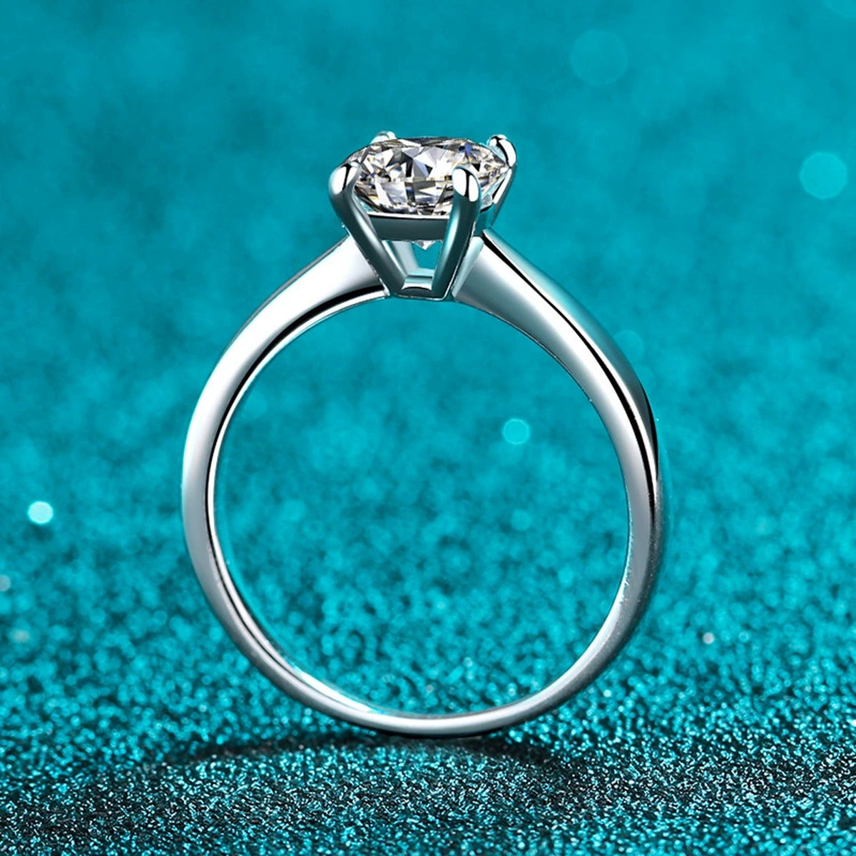 Round Moissanite Ring product view showing moissanite setting and rhodium finish