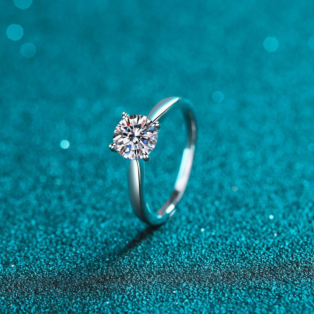 Round Moissanite Ring product view showing moissanite setting and rhodium finish