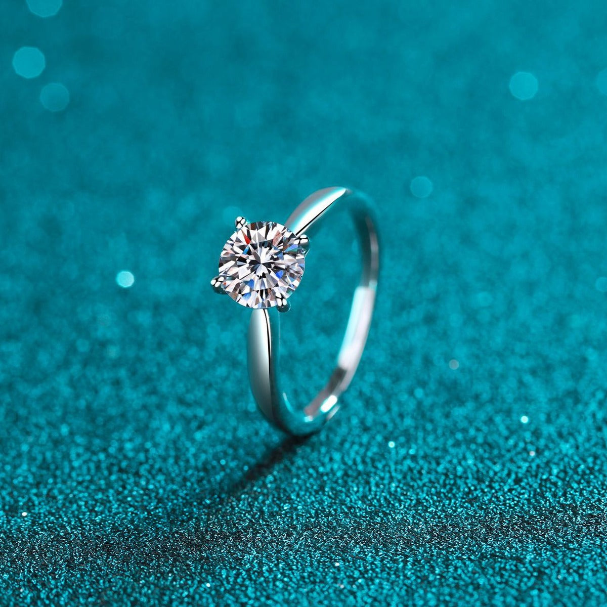 Round Moissanite Ring product view showing moissanite setting and rhodium finish