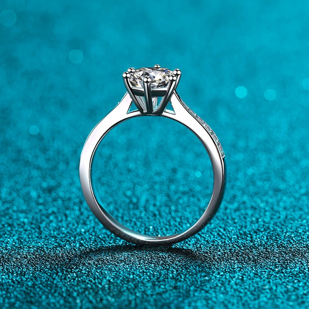 Round Moissanite Side Stone Ring with CZ product view showing moissanite setting and rhodium finish
