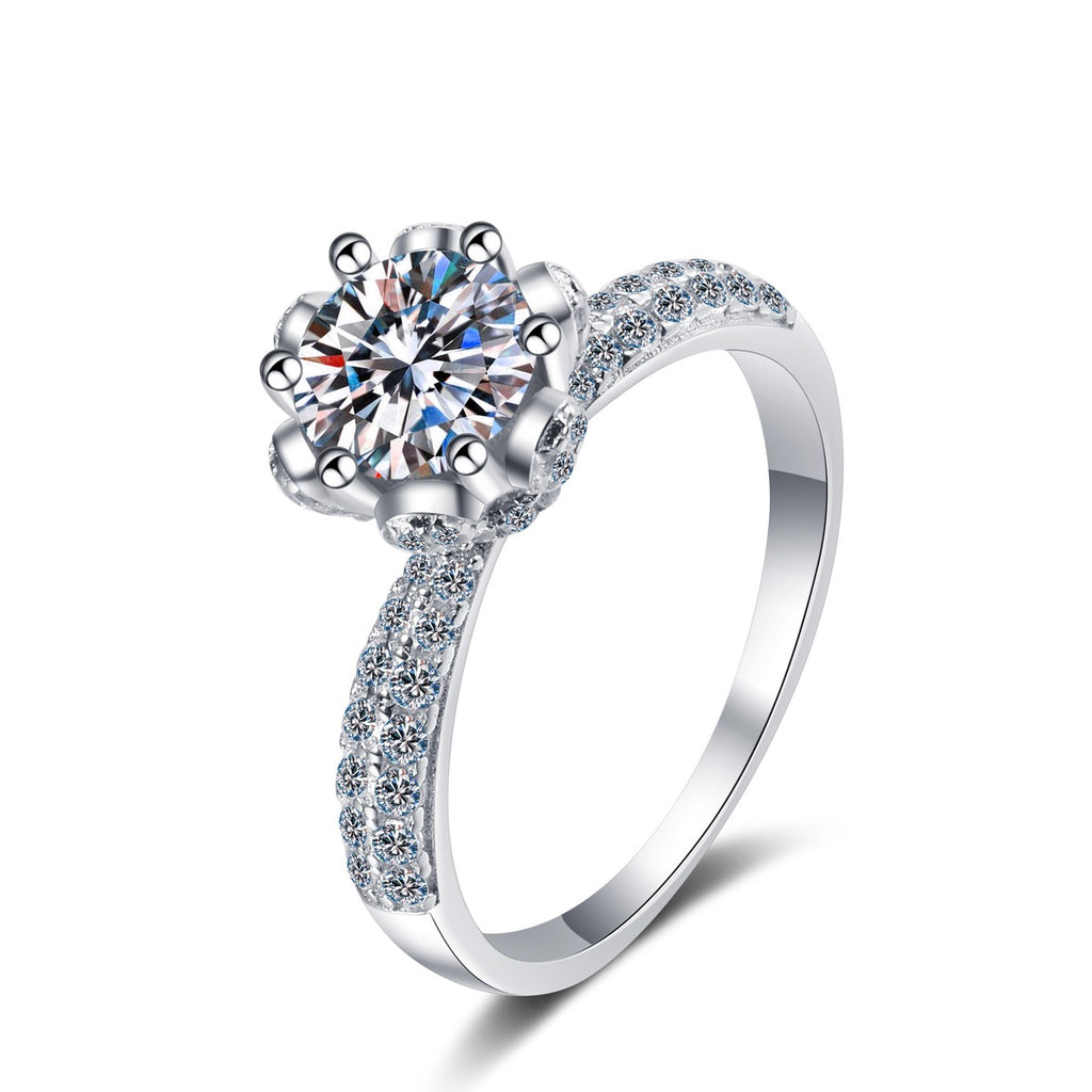 Round Moissanite Side Stone Ring with CZ in rhodium-plated S925 sterling silver on clean white background