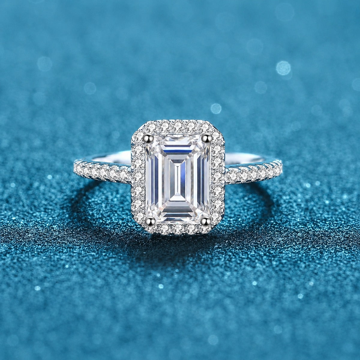 Emerald Cut Moissanite Halo Ring with CZ product view showing moissanite setting and rhodium finish