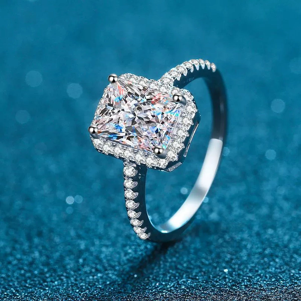 Emerald Cut Moissanite Halo Ring with CZ product view showing moissanite setting and rhodium finish