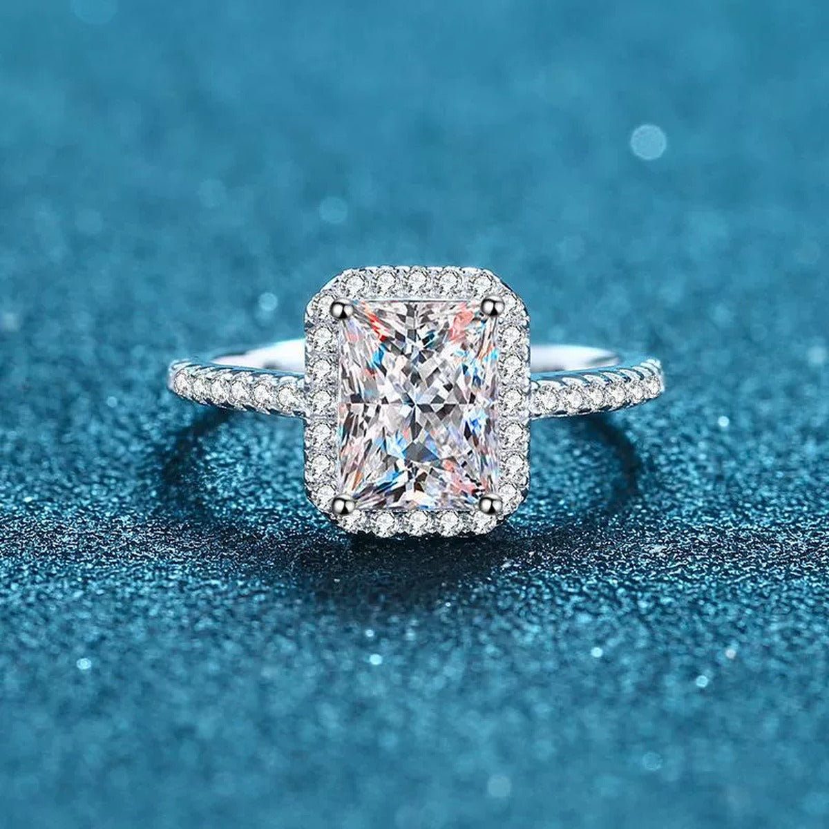 Emerald Cut Moissanite Halo Ring with CZ product view showing moissanite setting and rhodium finish