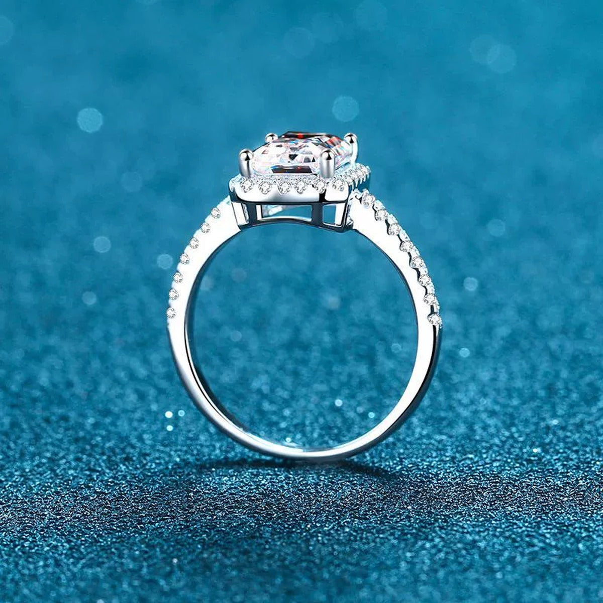 Emerald Cut Moissanite Halo Ring with CZ product view showing moissanite setting and rhodium finish