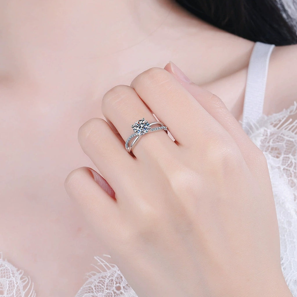 Round Moissanite Side Stone Ring with CZ worn on hand to show scale and ring profile