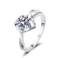 Round Moissanite Side Stone Ring with CZ in rhodium-plated S925 sterling silver on clean white background