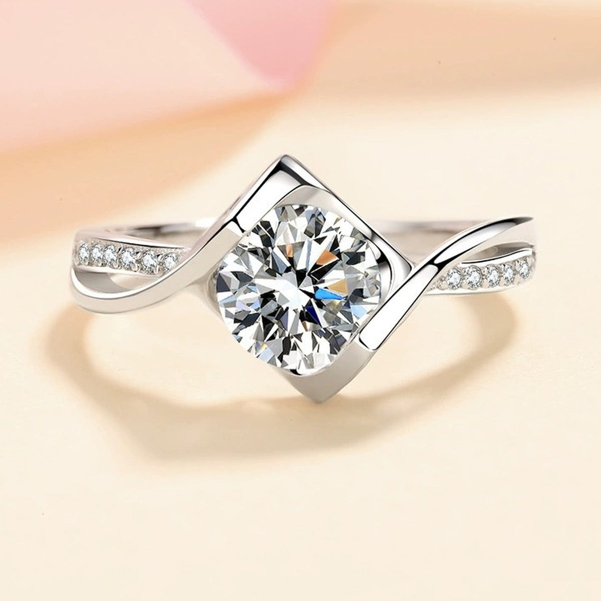 Round Moissanite Side Stone Ring with CZ worn on hand to show scale and ring profile