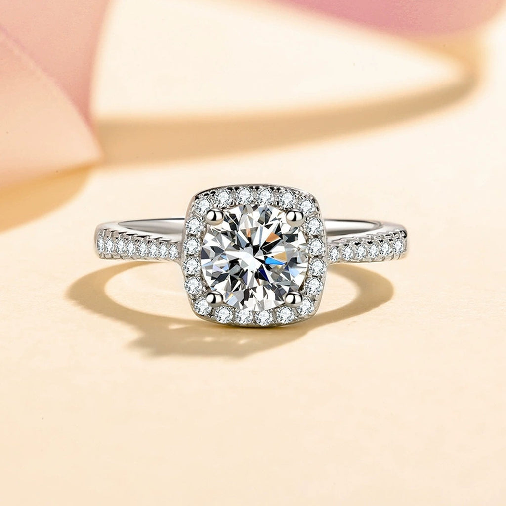 Cushion Halo Moissanite Ring with CZ worn on hand to show scale and ring profile