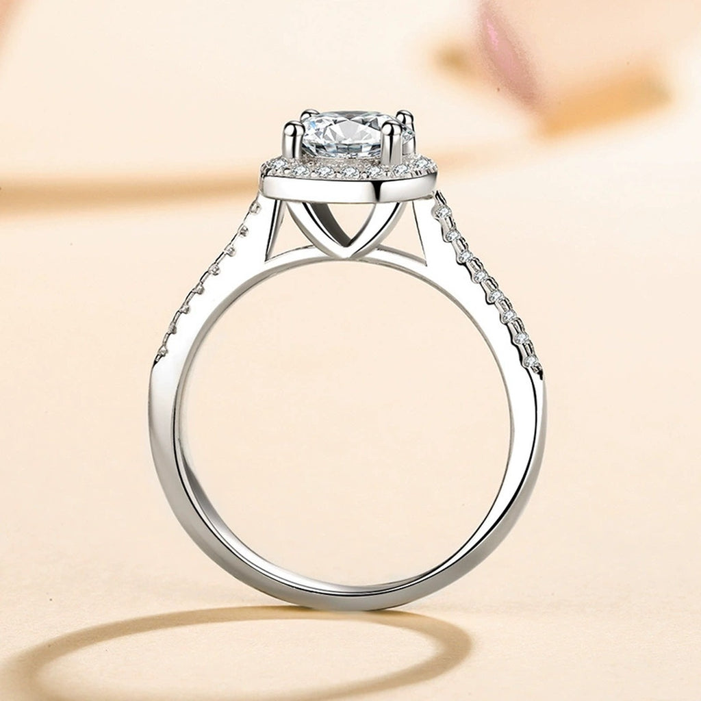 Cushion Halo Moissanite Ring with CZ worn on hand to show scale and ring profile
