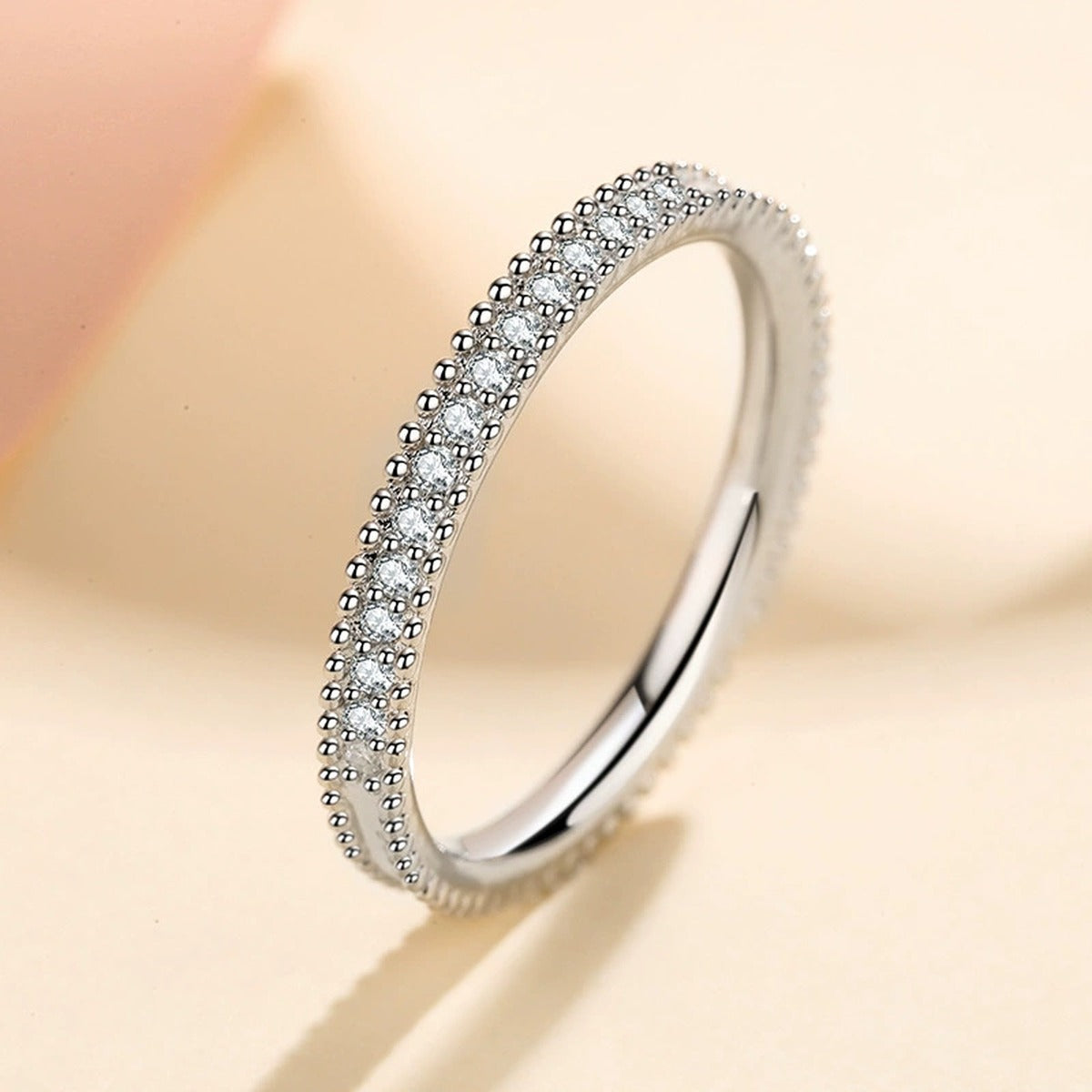 Round Moissanite Ring worn on hand to show scale and ring profile