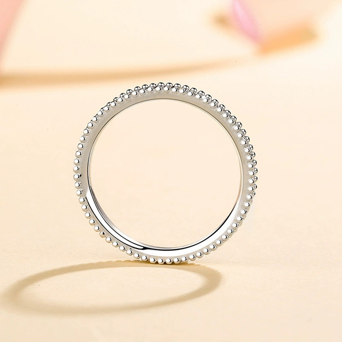 Round Moissanite Ring worn on hand to show scale and ring profile