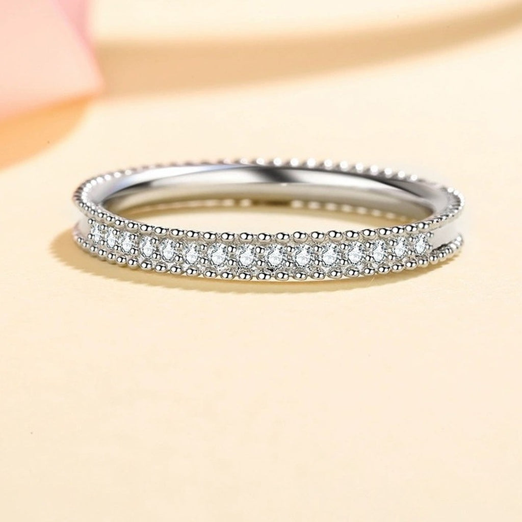 Round Moissanite Ring worn on hand to show scale and ring profile