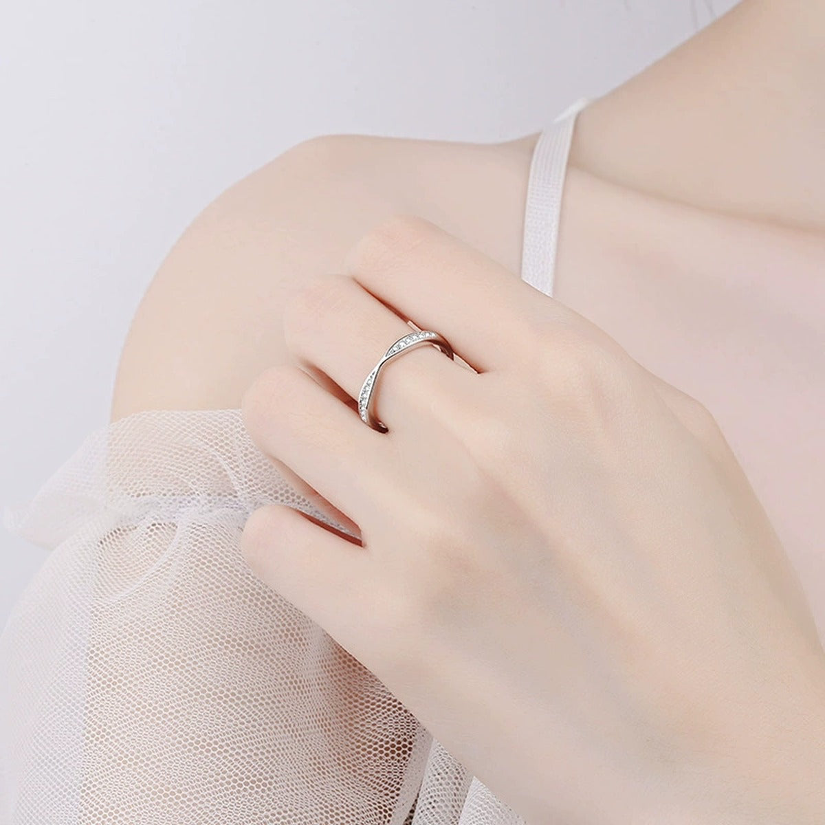 Round Moissanite Ring worn on hand to show scale and ring profile