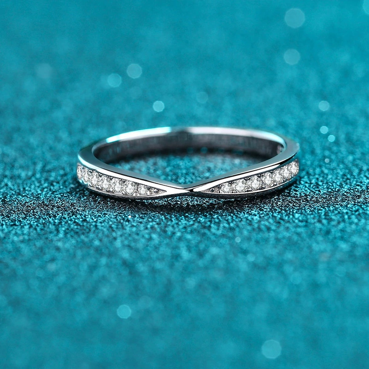 Round Moissanite Ring product view showing moissanite setting and rhodium finish