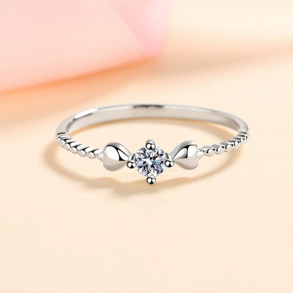 Floral Moissanite Ring worn on hand to show scale and ring profile
