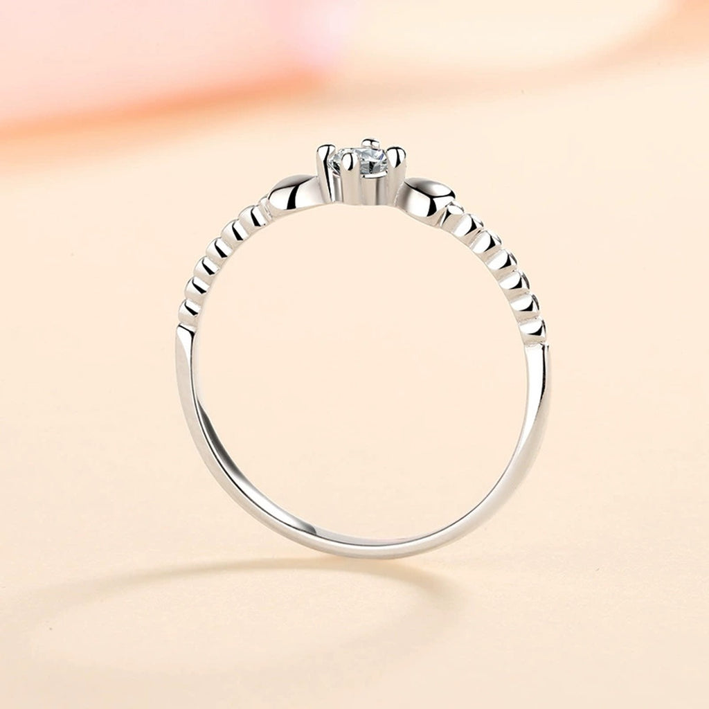 Floral Moissanite Ring worn on hand to show scale and ring profile