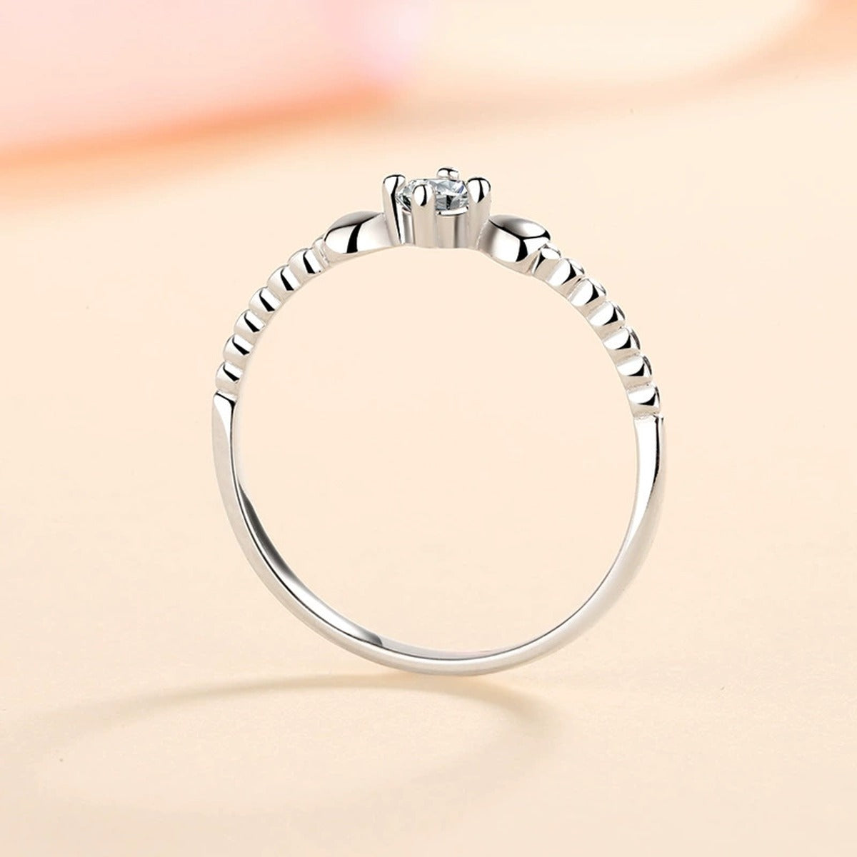 Floral Moissanite Ring worn on hand to show scale and ring profile