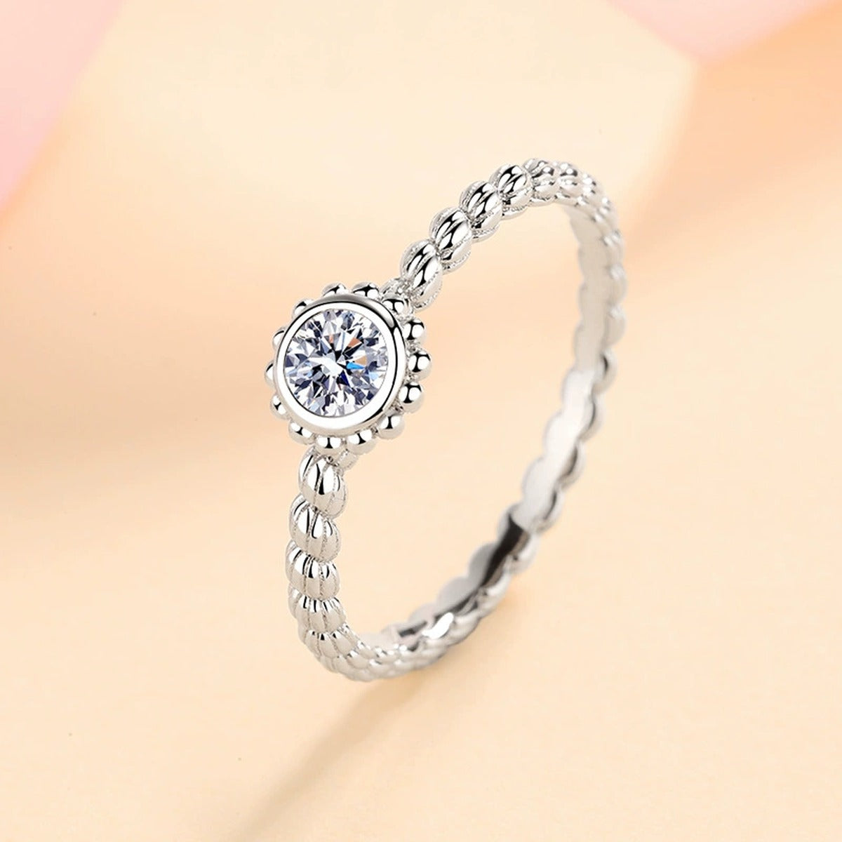Bezel Moissanite Band Ring worn on hand to show scale and ring profile