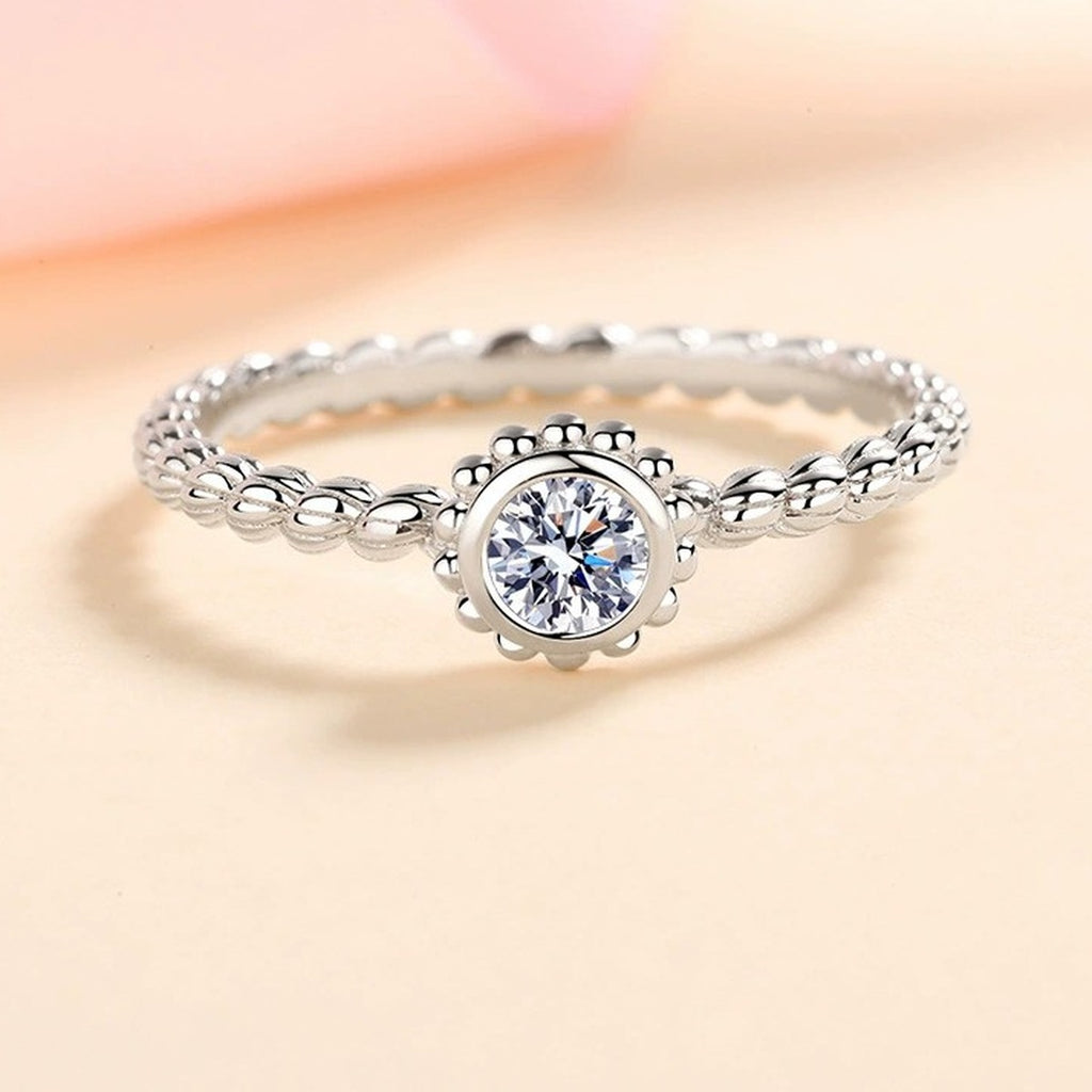 Bezel Moissanite Band Ring worn on hand to show scale and ring profile