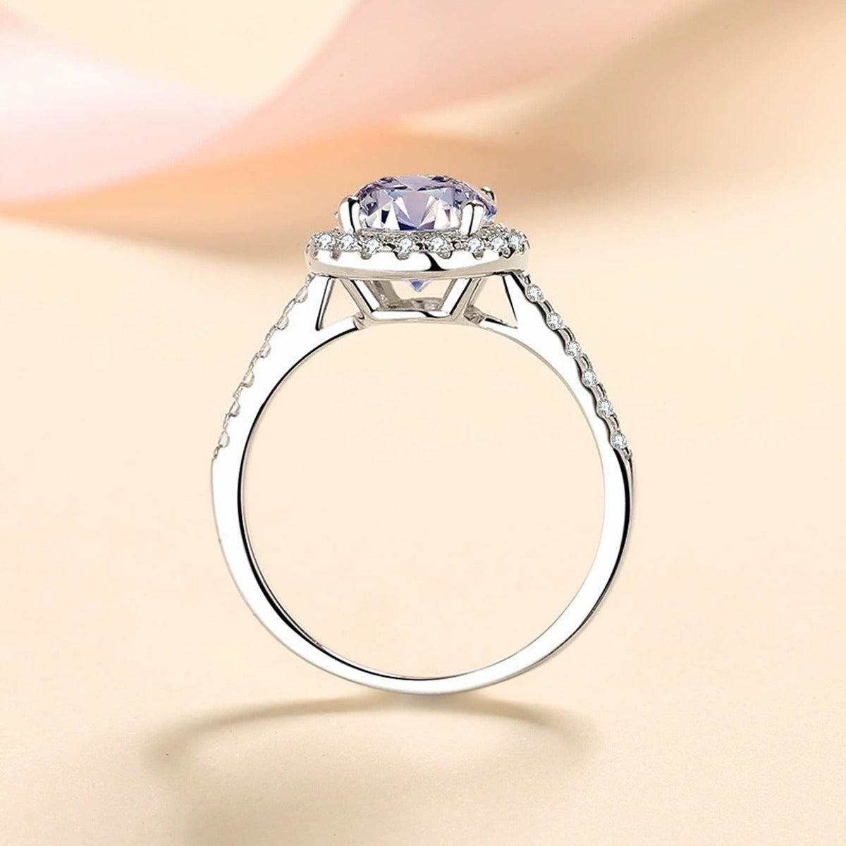 Oval Moissanite Ring with CZ worn on hand to show scale and ring profile