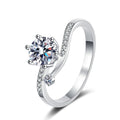 Round Moissanite Side Stone Ring with CZ in rhodium-plated S925 sterling silver on clean white background