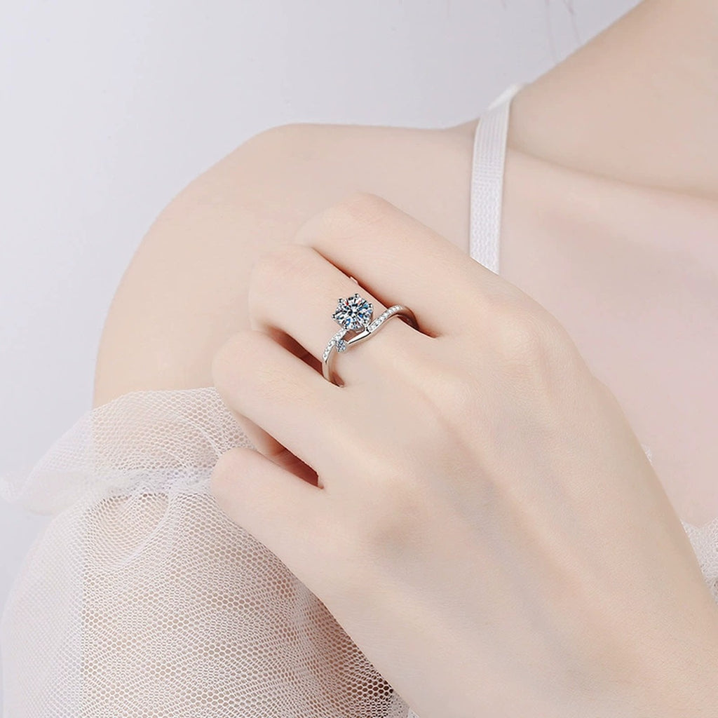 Round Moissanite Side Stone Ring with CZ worn on hand to show scale and ring profile
