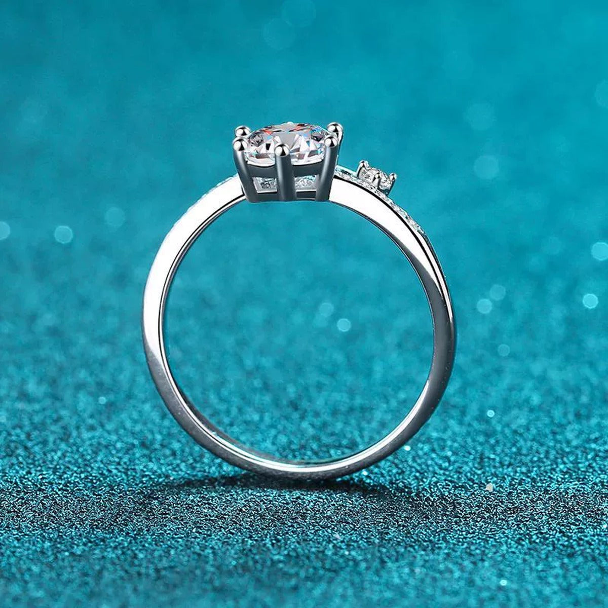 Round Moissanite Side Stone Ring with CZ product view showing moissanite setting and rhodium finish