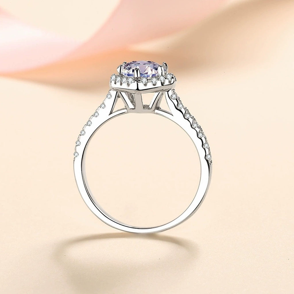 Heart Cut Moissanite Ring with CZ worn on hand to show scale and ring profile